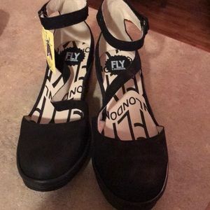 FLY London closed toe sandal.